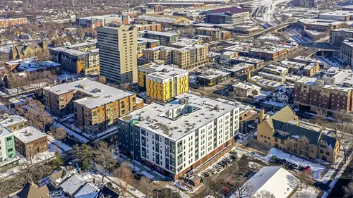 UNCOMMON Dinkytown with Minneapolis Skyline in Background