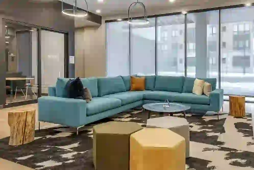 Student Lounge with Oversized Blue Sofa