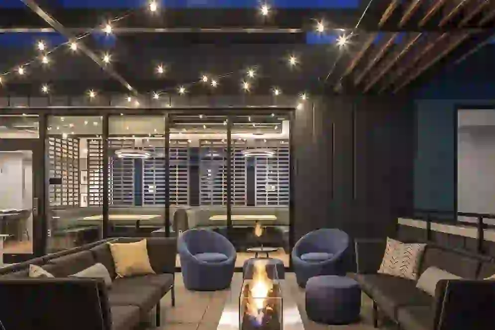 Outdoor Fire Pit with Study Space Visible Through Window