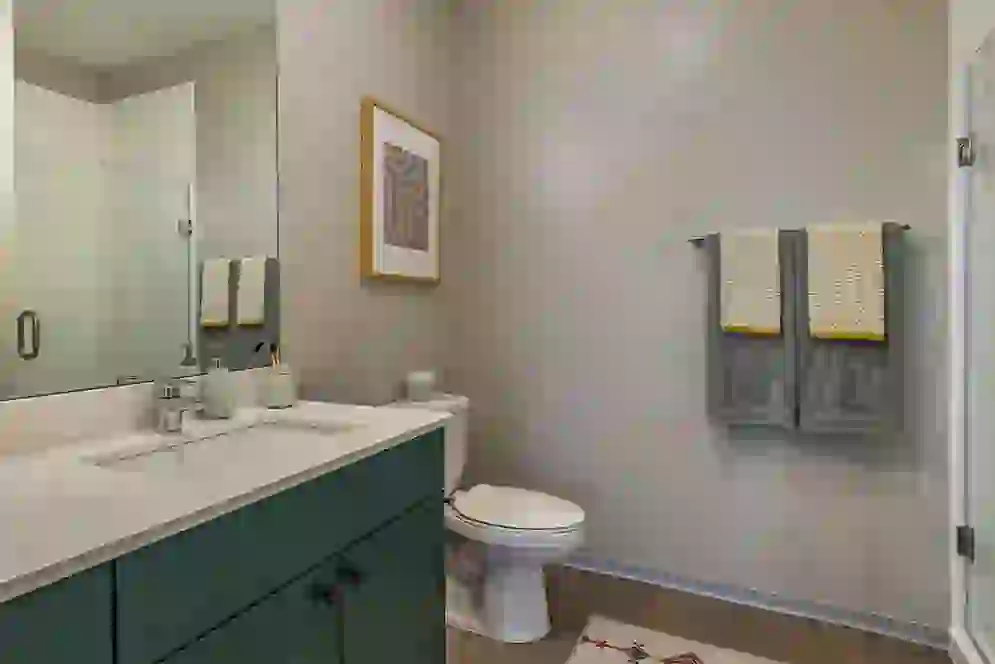 Bathroom Vanity and Toilet in UNCOMMON Dinkytown Student Apartment